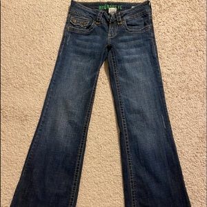 Hydraulic low waisted, wide legged jeans